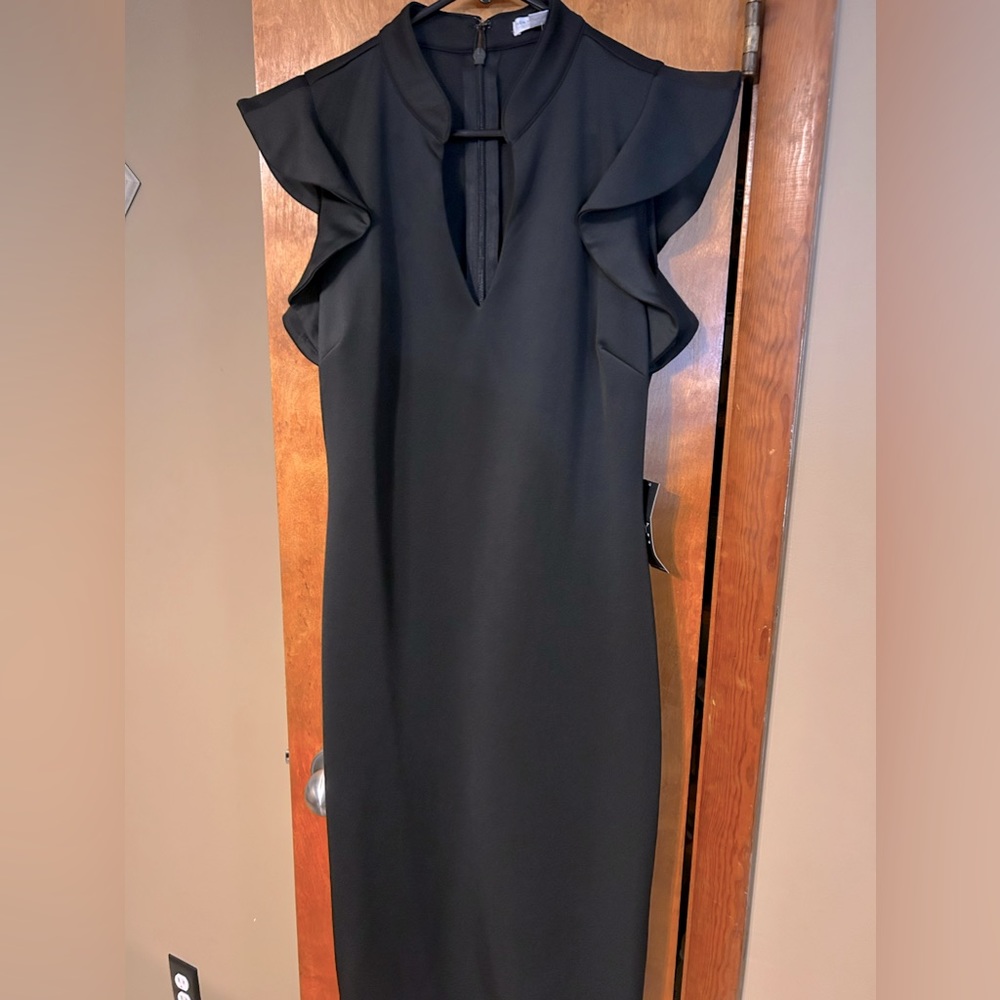 Black dress from New York & Company. Never worn. Has some stretch to it